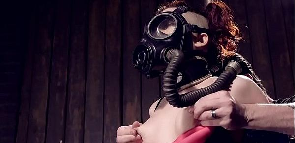  Redhead with gas mask tormented